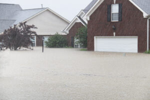 flood overtaking a brick house