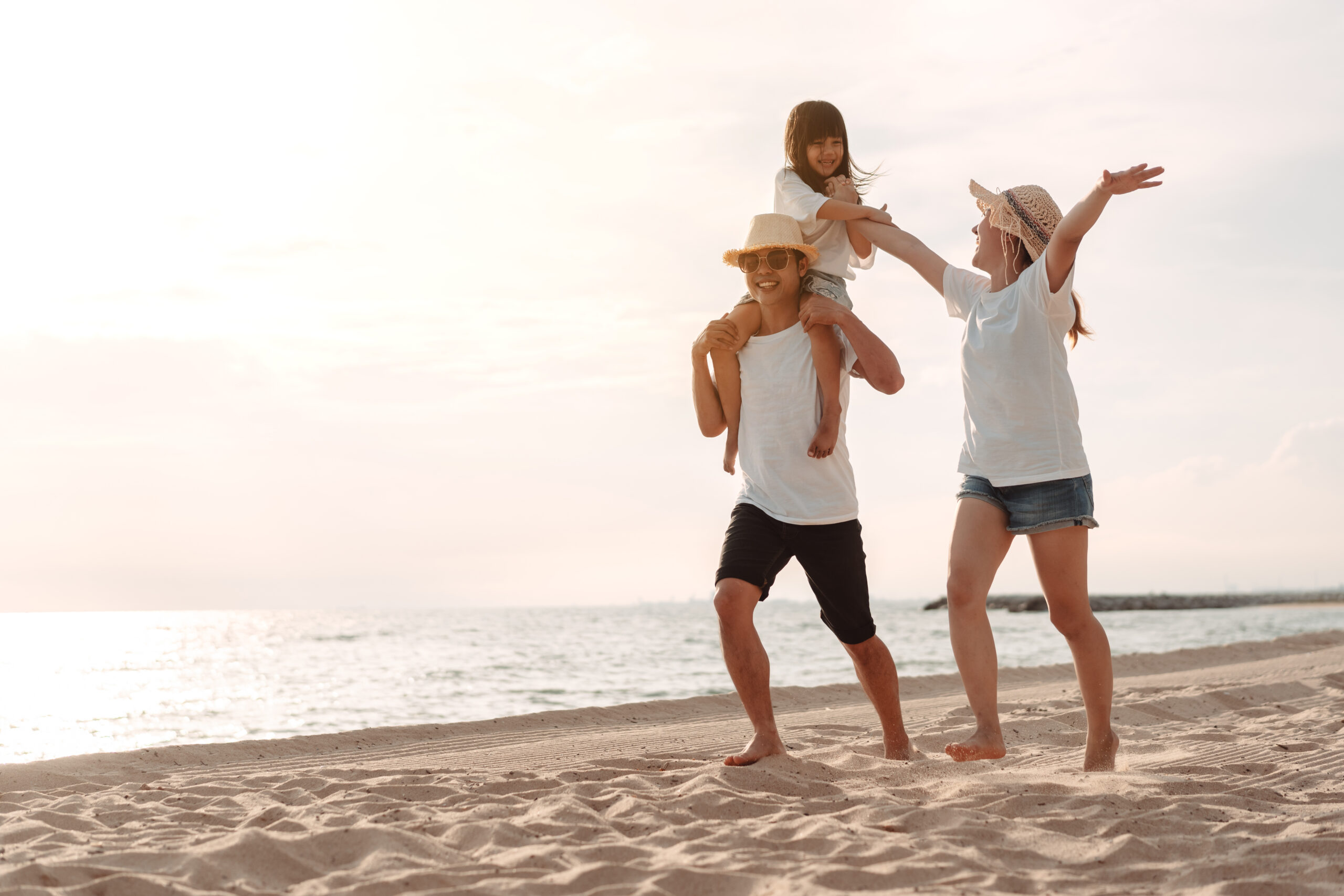Family walking on the beach