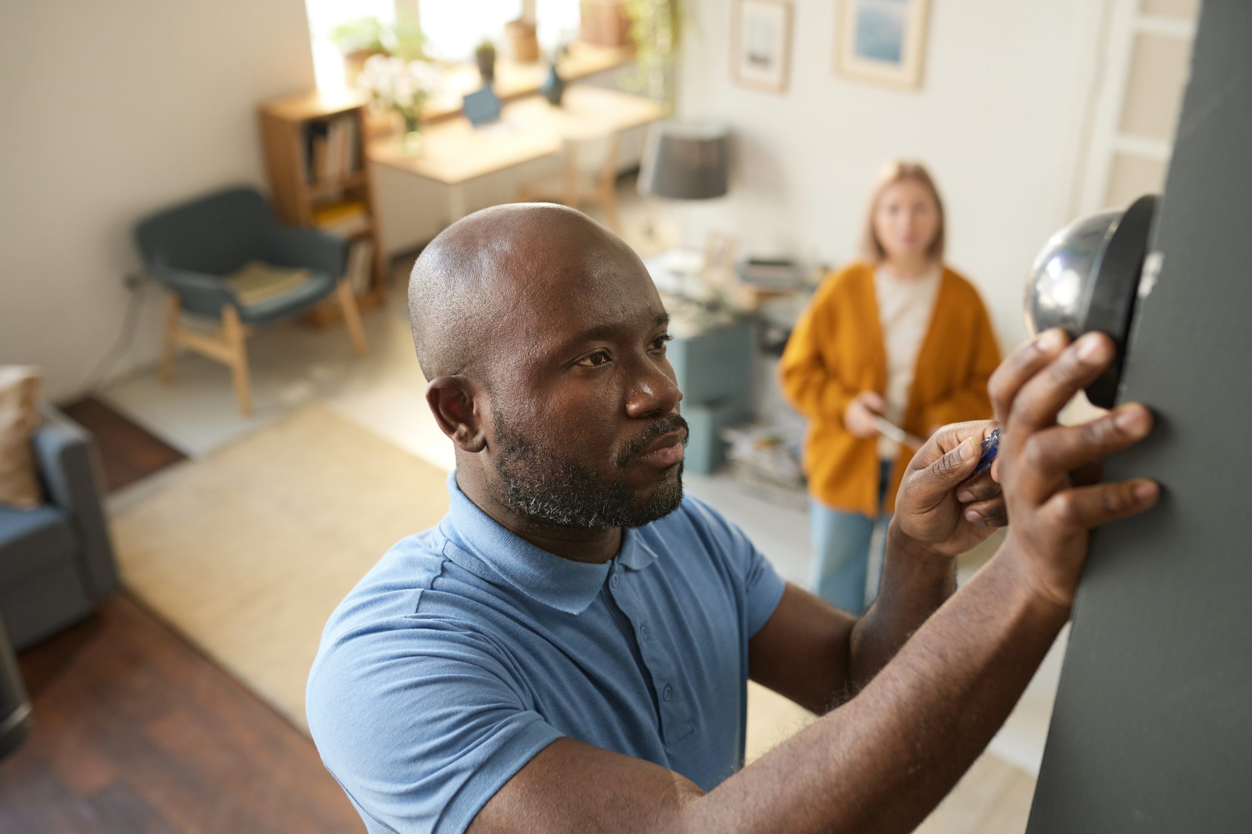 home inspector examining house