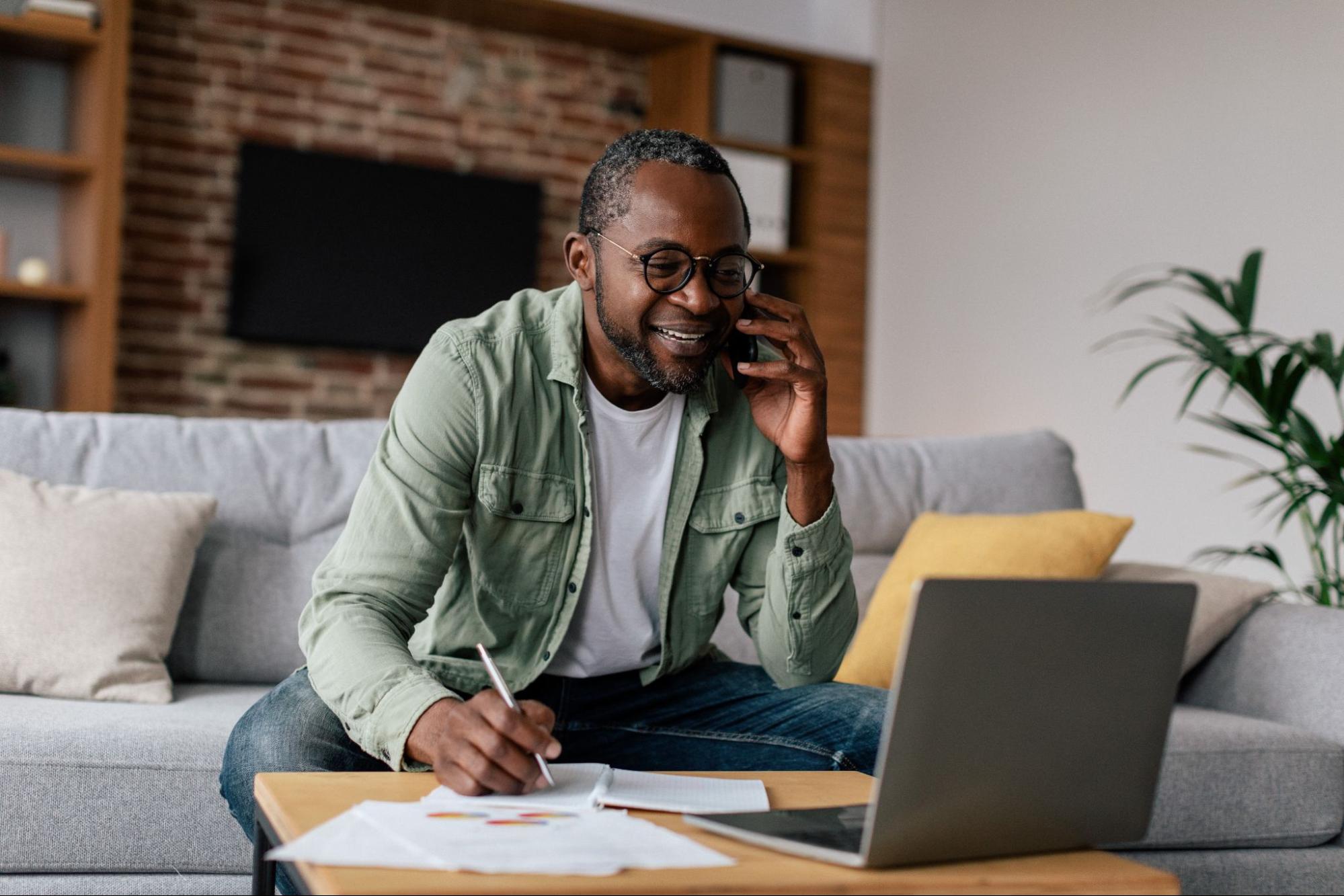 man working on laptop at home